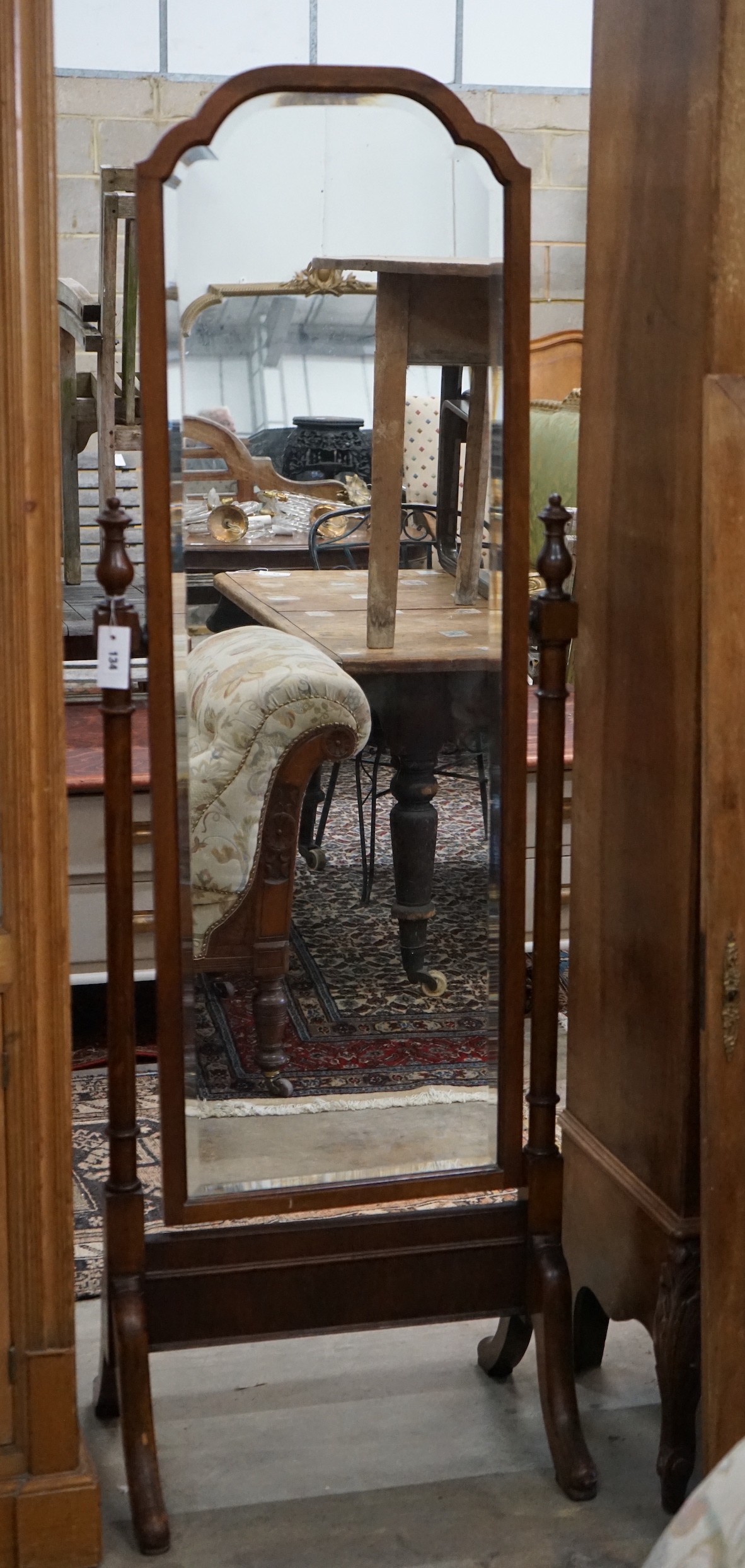 A 1920's mahogany cheval mirror, width 58cm, height 169cm